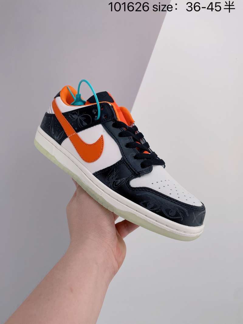 orange black and white dunks