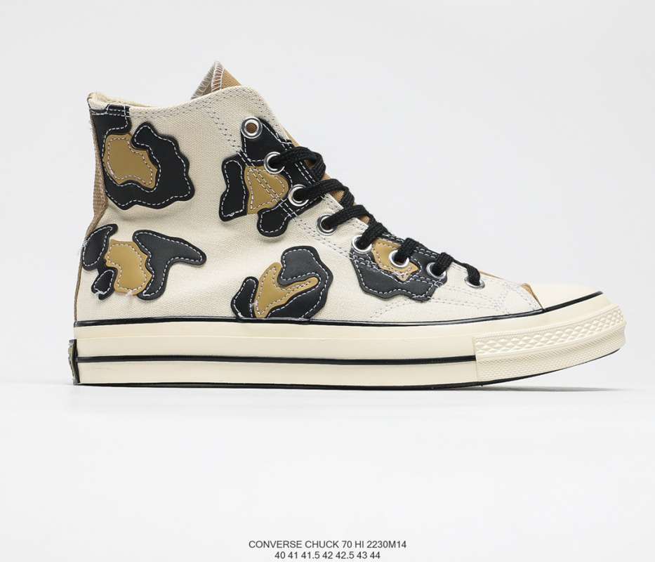 converse cow pattern