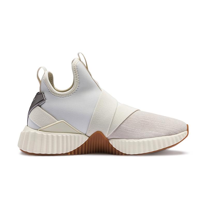 puma defy mid junior