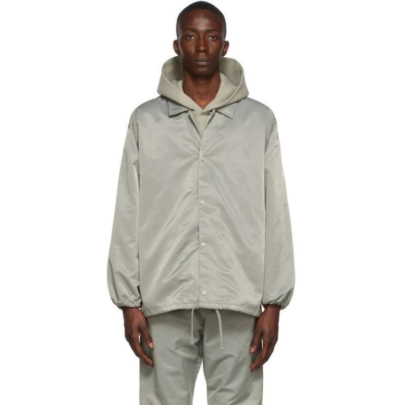 Fear of god essentials coach jacket hot sale