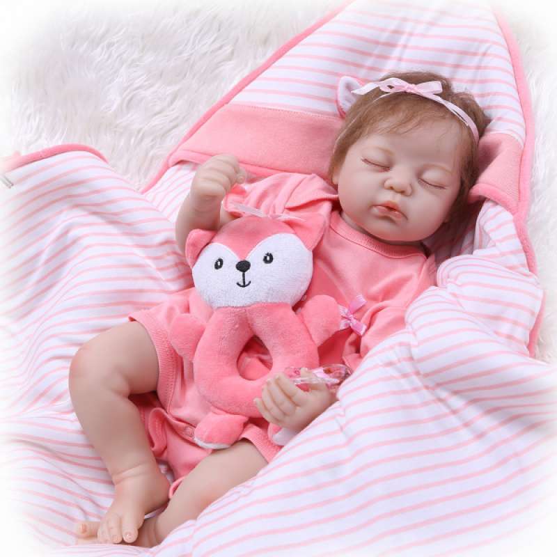 baby doll with blanket