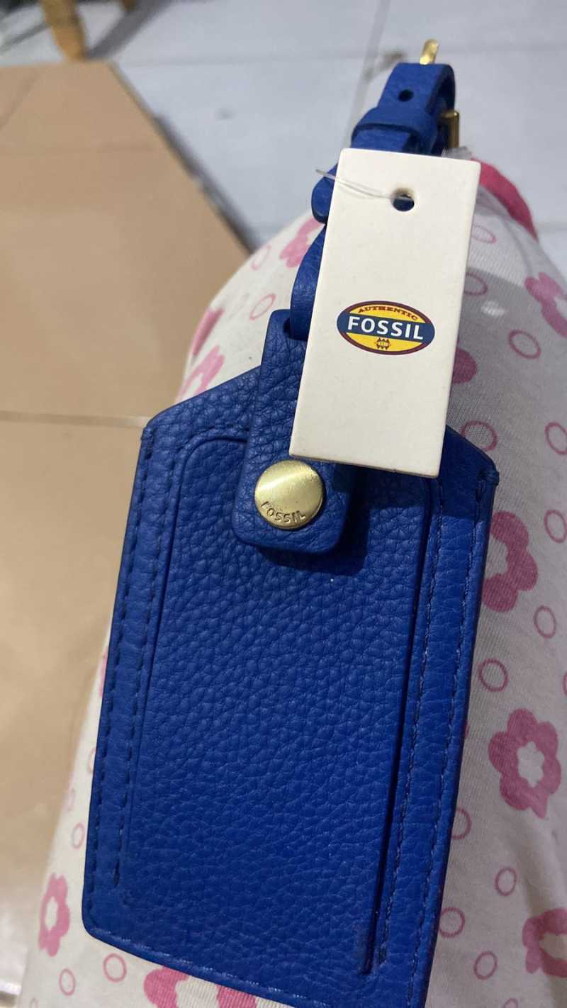 Fossil luggage tag deals