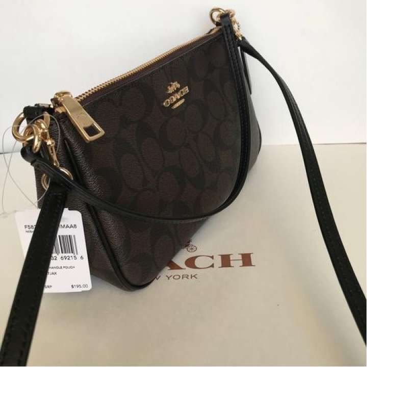 coach top handle pouch signature