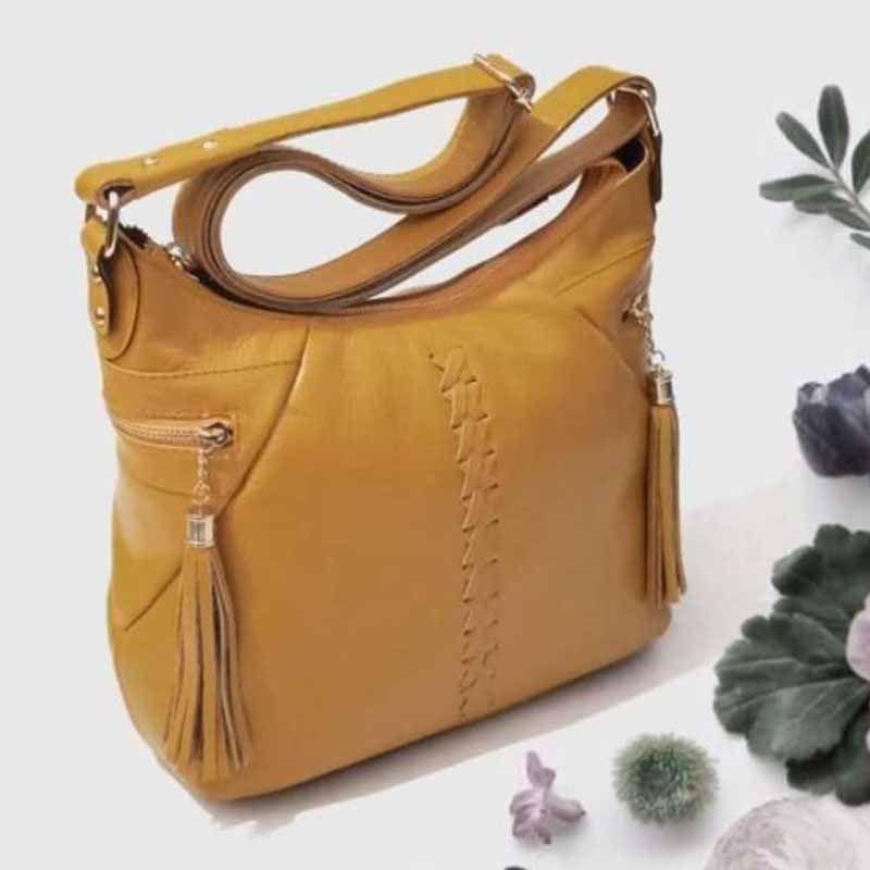 handcrafted sling bags