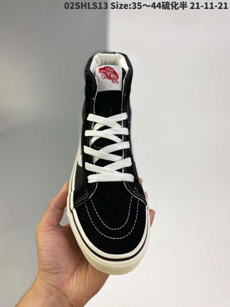 vans high top black shoes