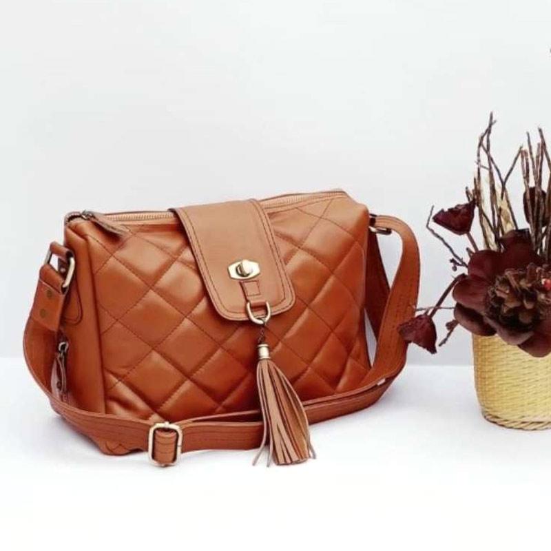 handcrafted sling bags