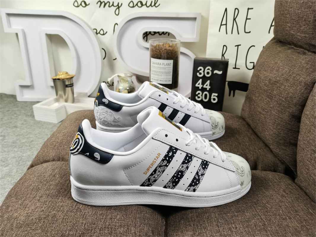 Adidas superstar bianche con strisce nere shop