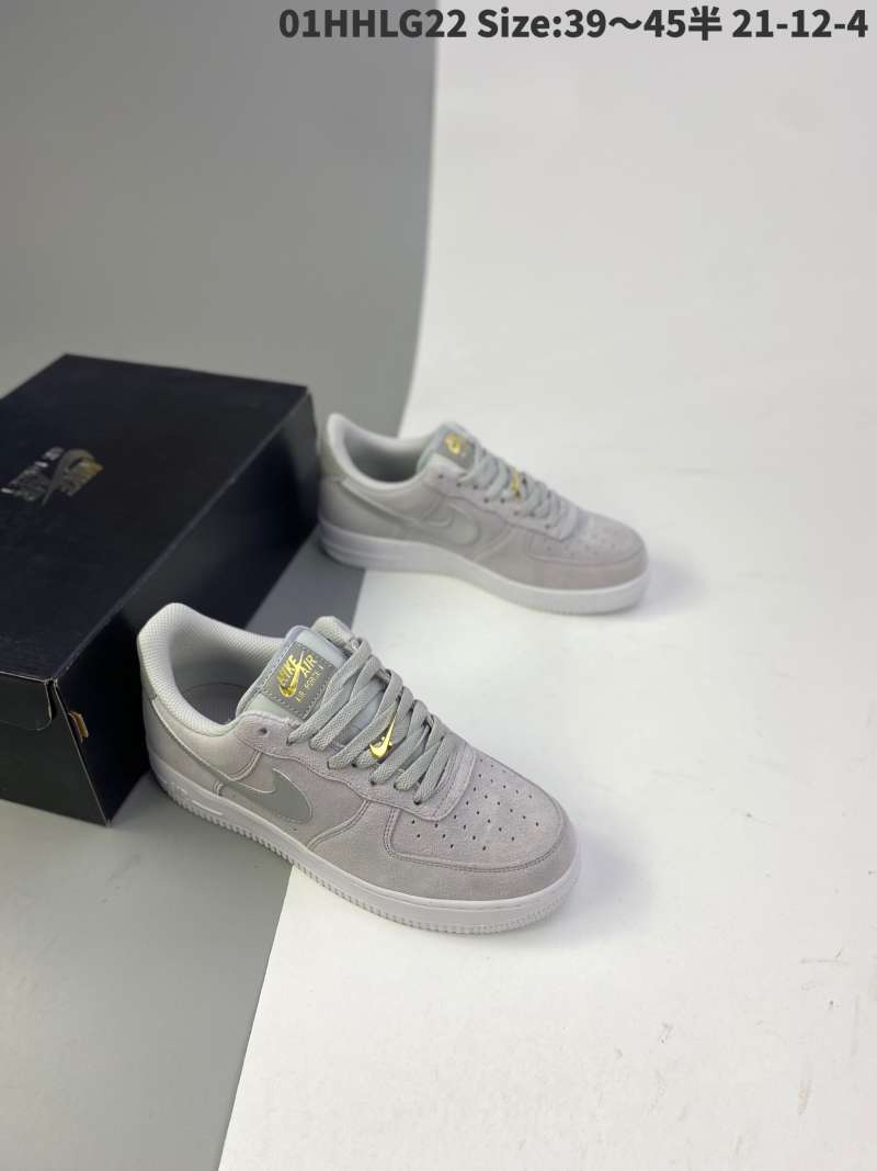 nike grey and gold shoes