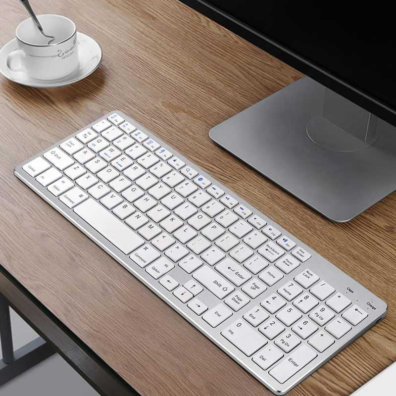 compact bluetooth wireless keyboard slim flat quiet 90 less noise with numeric keypad for windows ios android mobile phones pc desktop notebook