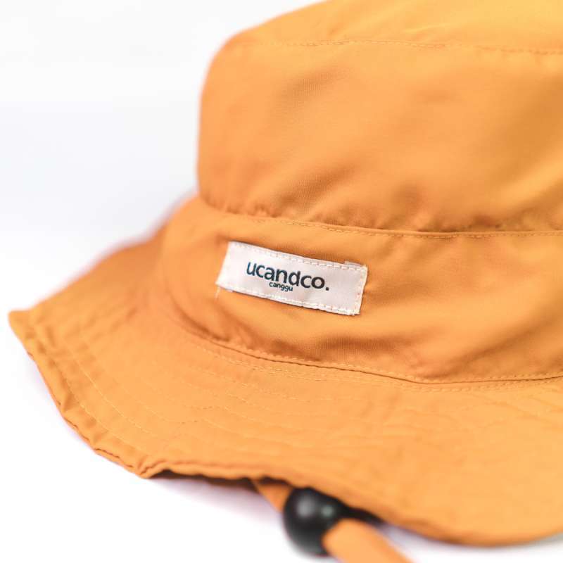 Jual BUCKET HAT LABEL MUSTARD di Seller 