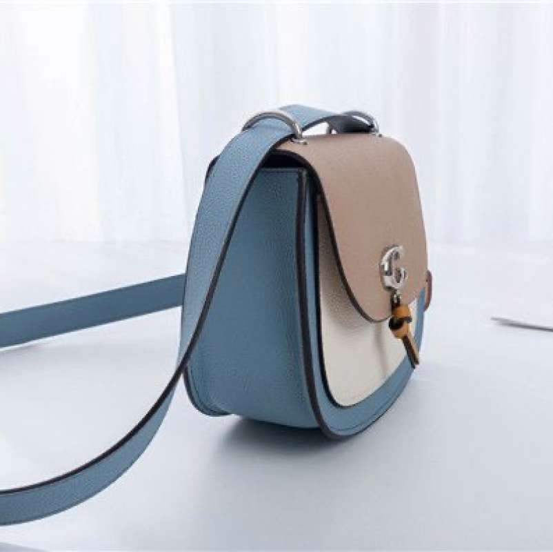 remi saddle bolsa in colorblock