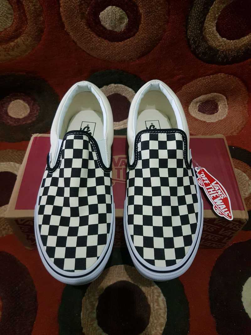 Vans slip deals on checkerboard global