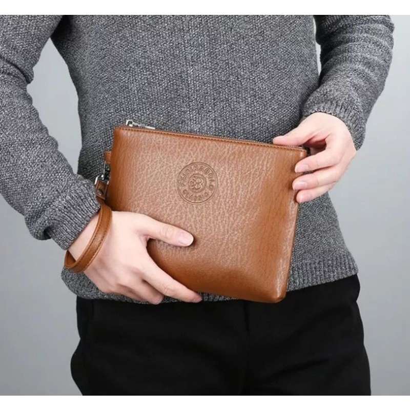 Clutch bag pria coach hot sale