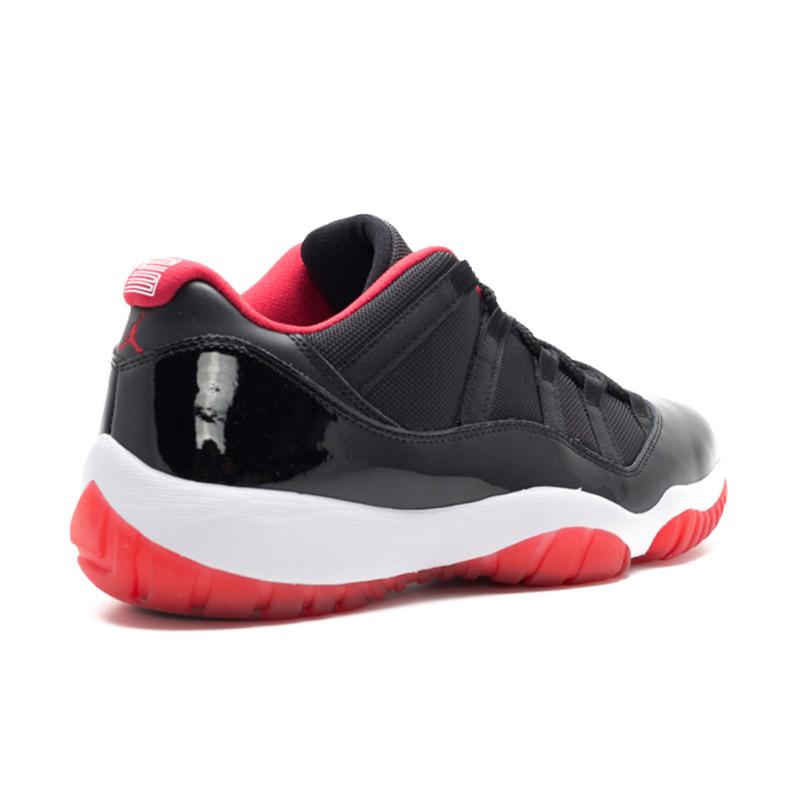 black jordan 11 low top