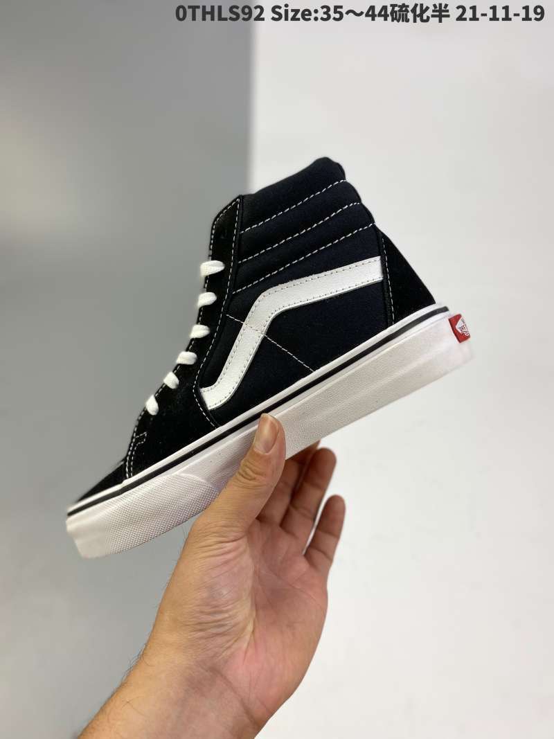 mens black and white high top vans
