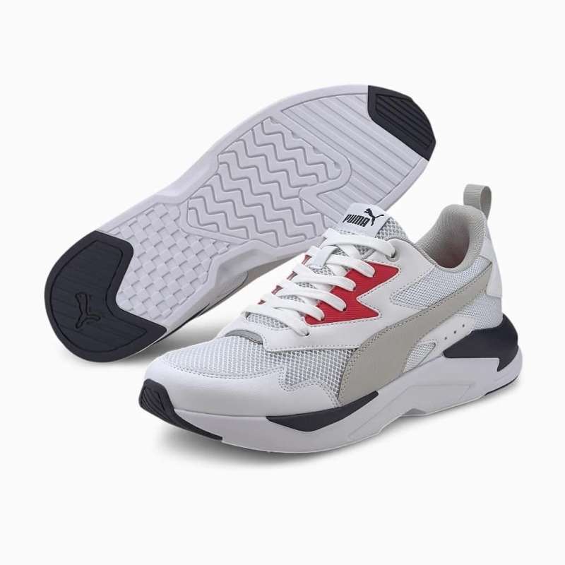 grey and red puma shoes