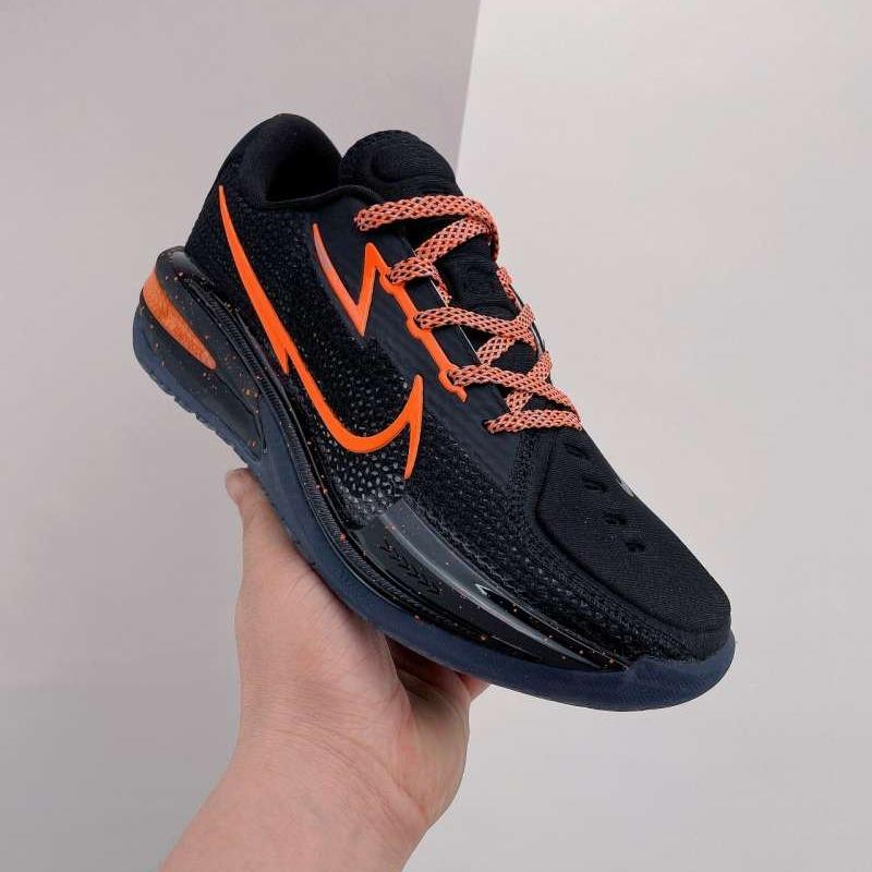 Nike shoes black and orange clearance