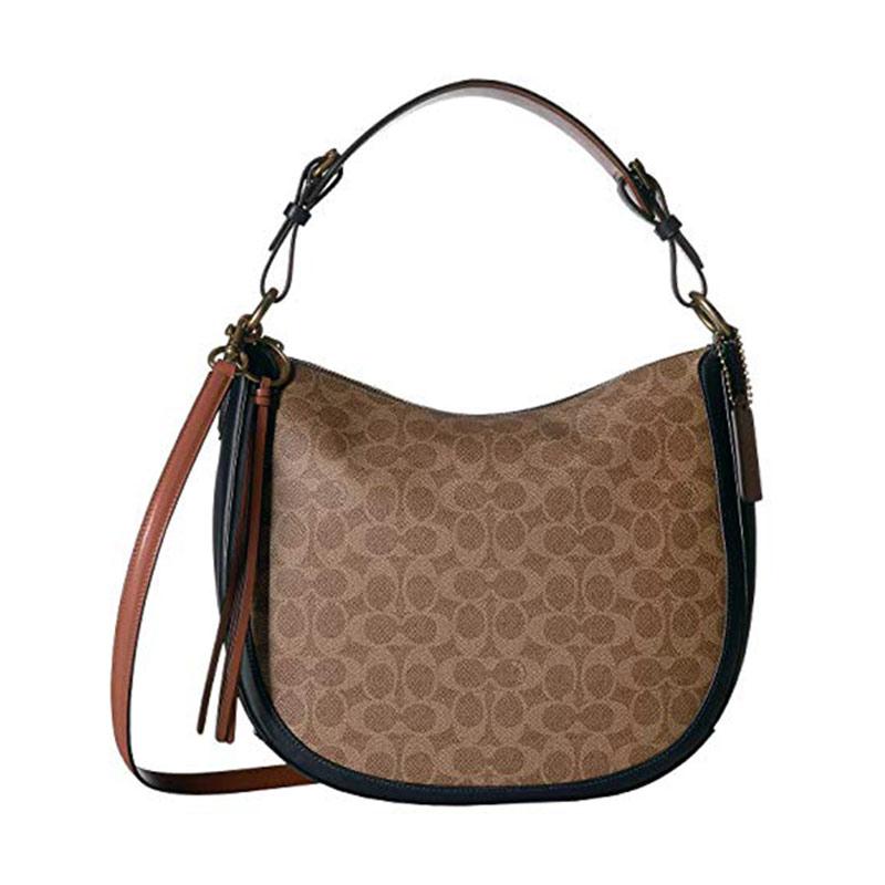 coach bag harga