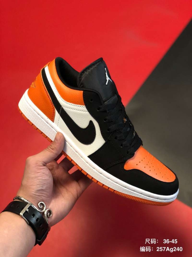 orange and white low top 1s