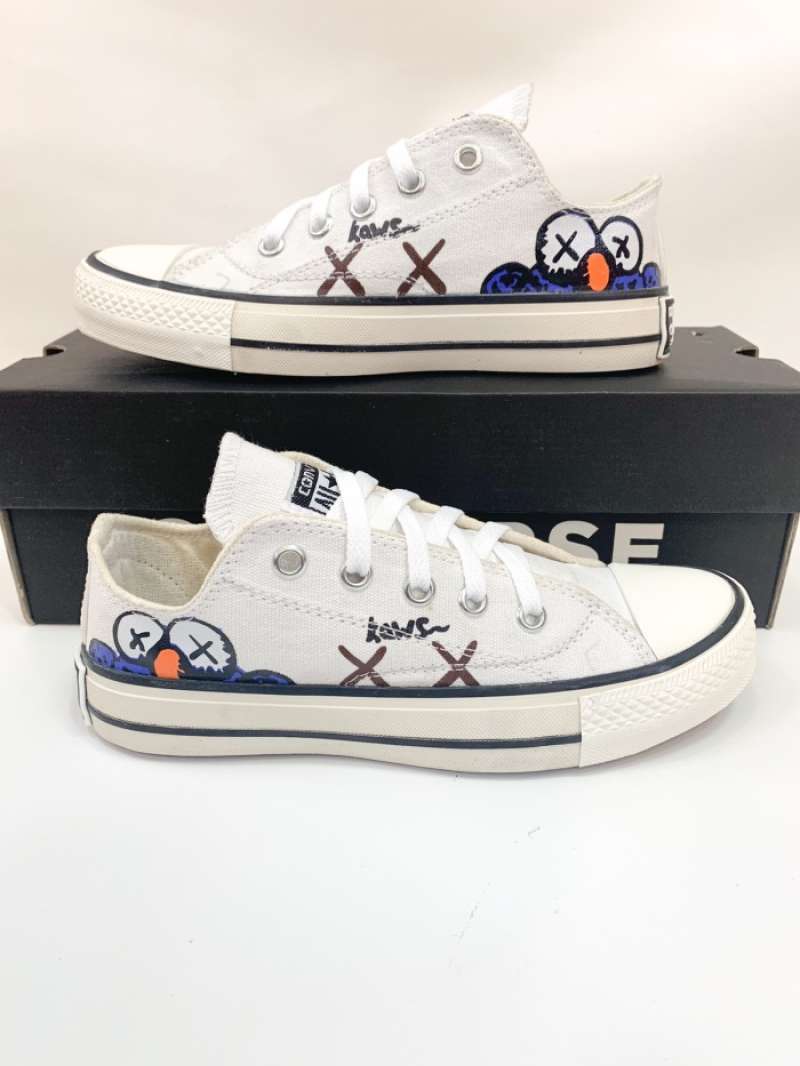 kaws converse