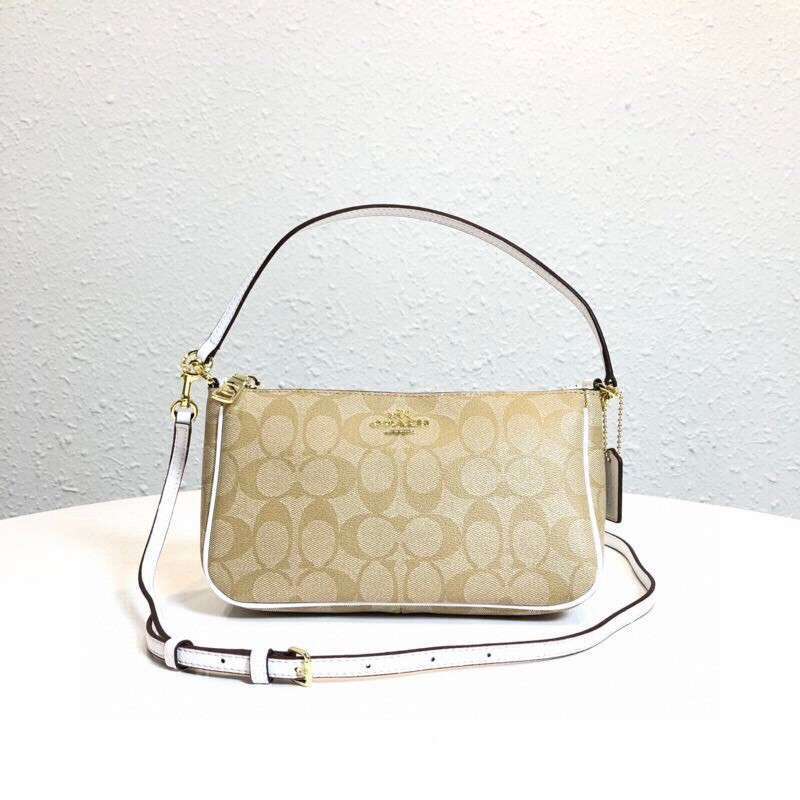 Coach top handle best sale pouch in signature original