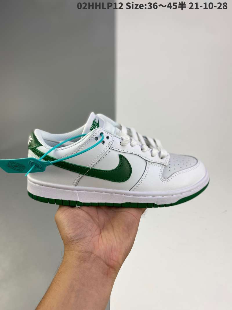 white and green low dunks