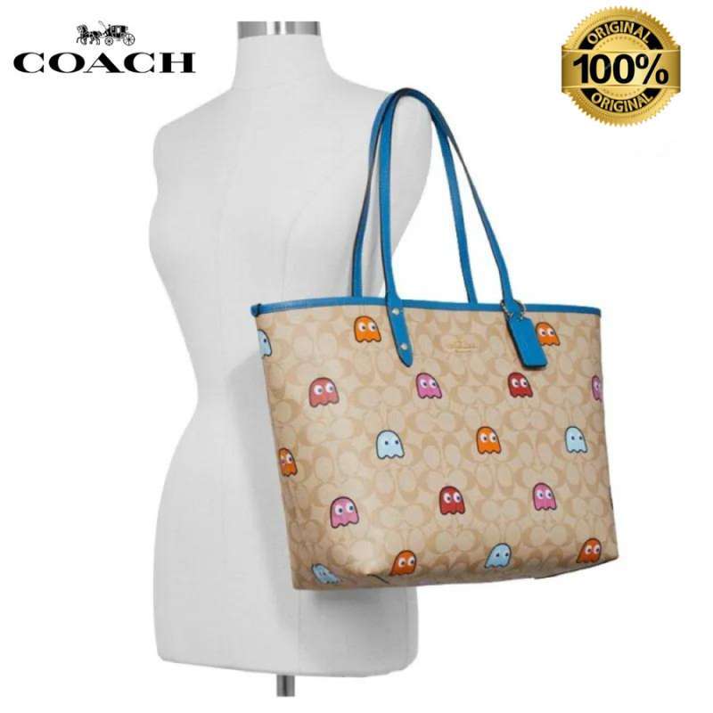 Coach pac deals man reversible tote
