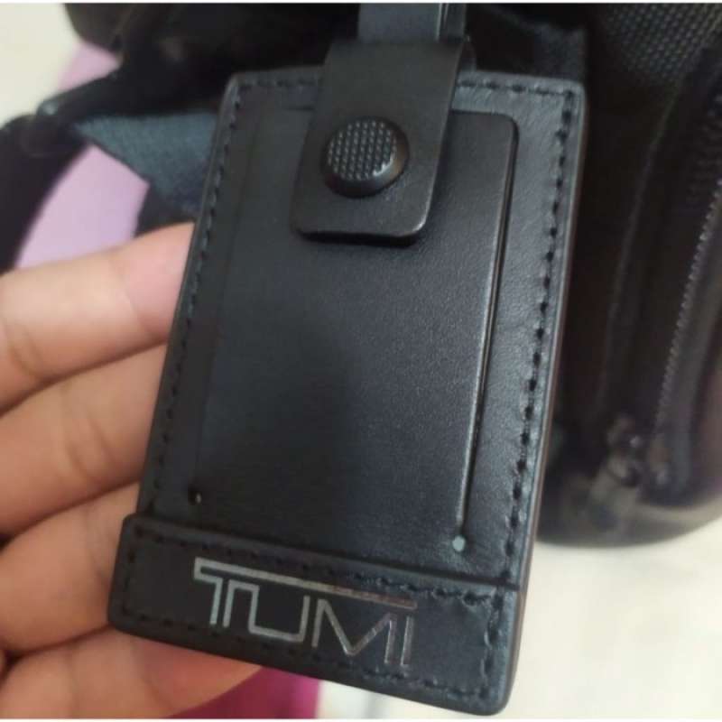 Name best sale tag tumi