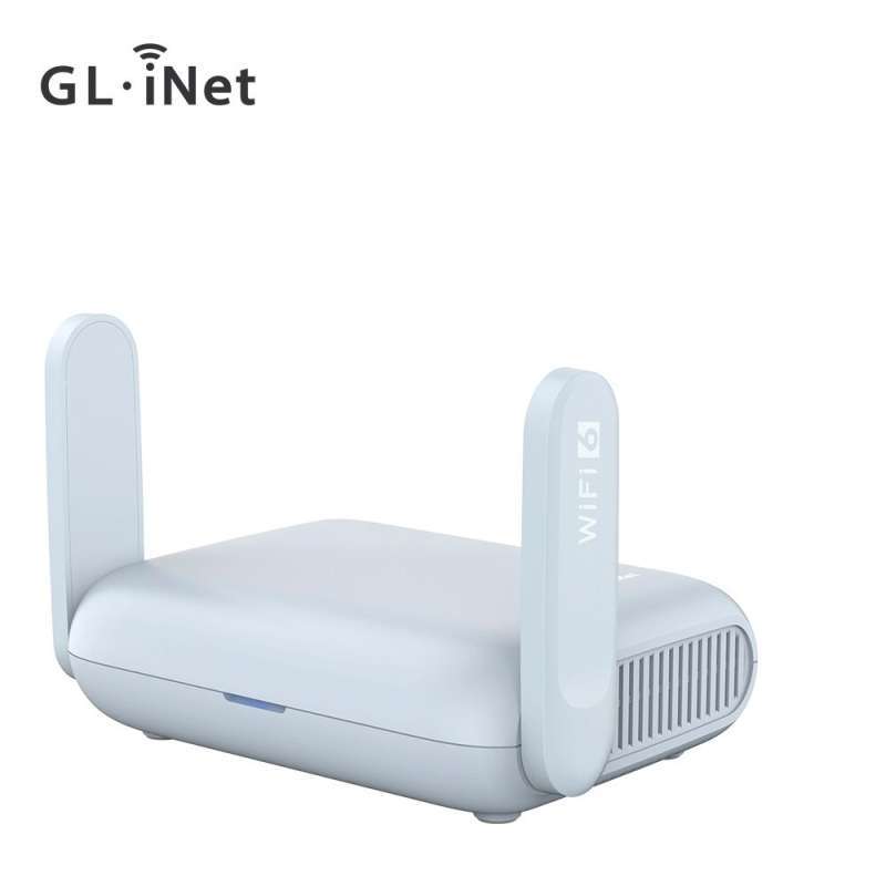 Travel router kecil berwarna putih dengan antena internal untuk koneksi portabel