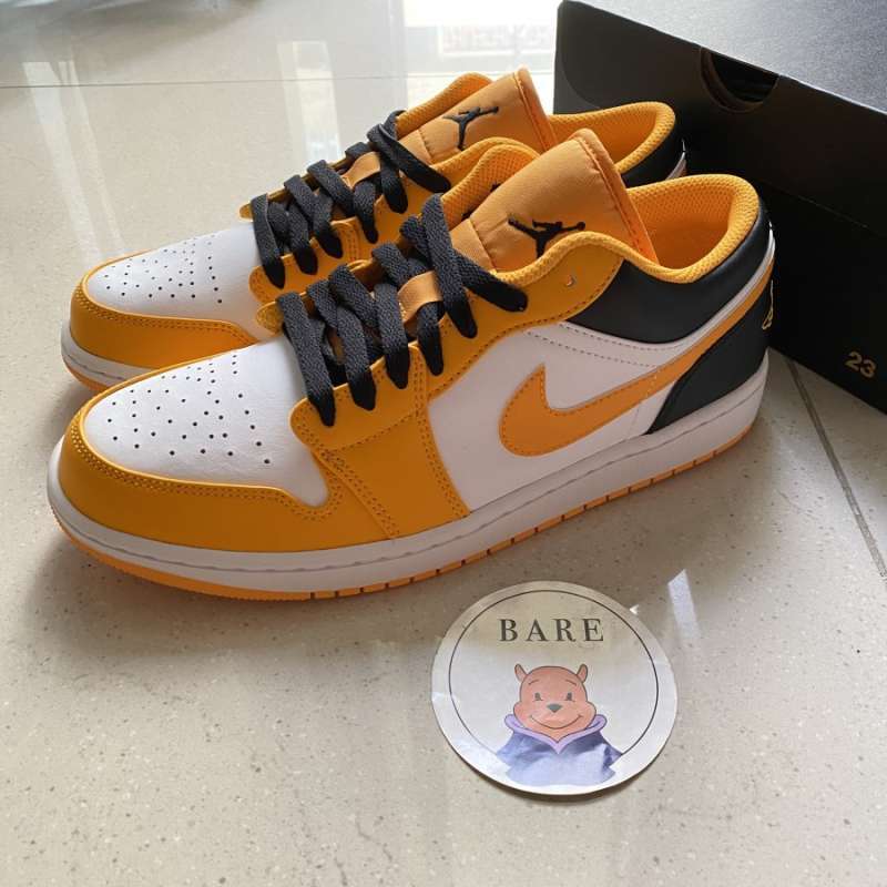 Jual Air Jordan 1 Low University Gold White / Taxi [553558-701