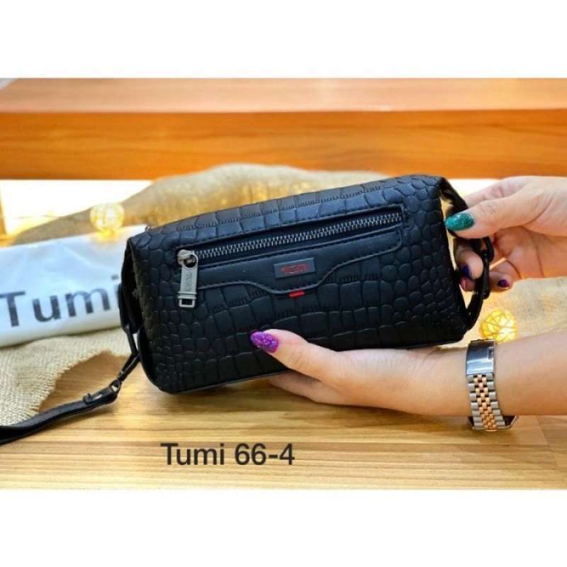 Clutch tumi hot sale
