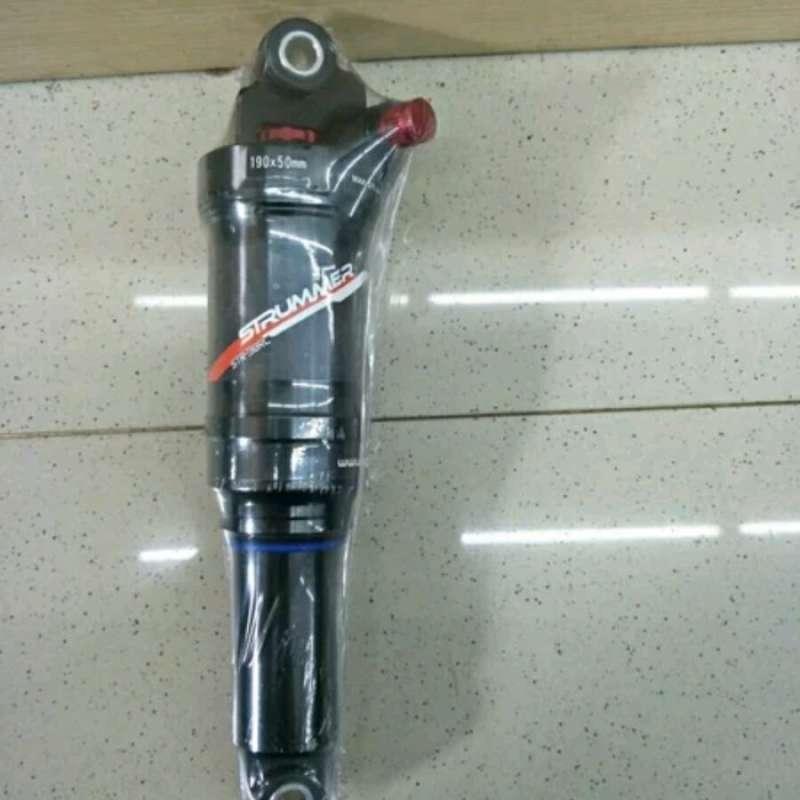 Rear sales shock strummer