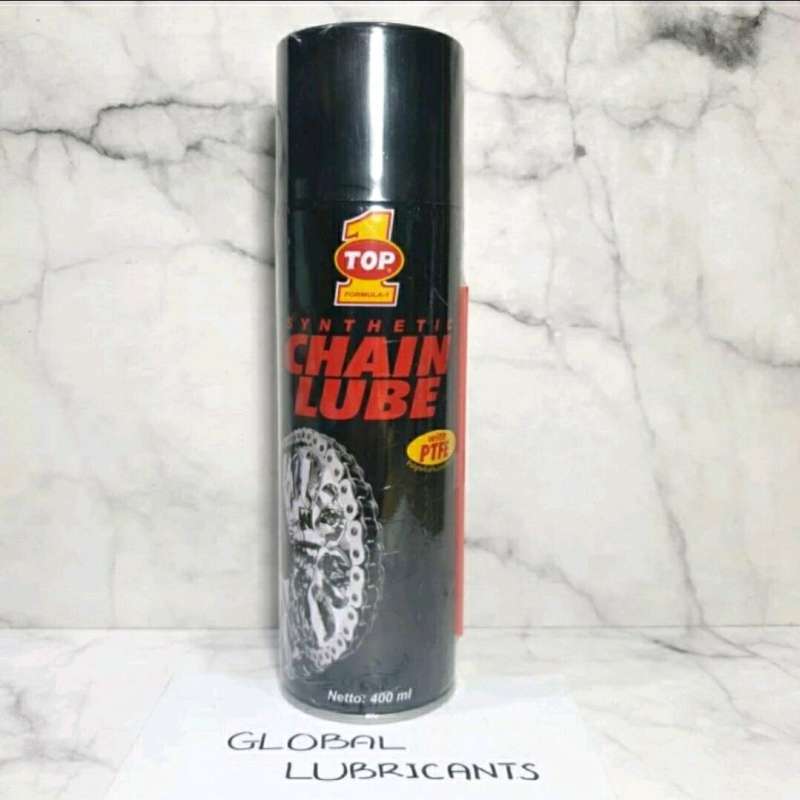 Top outlet chain lube