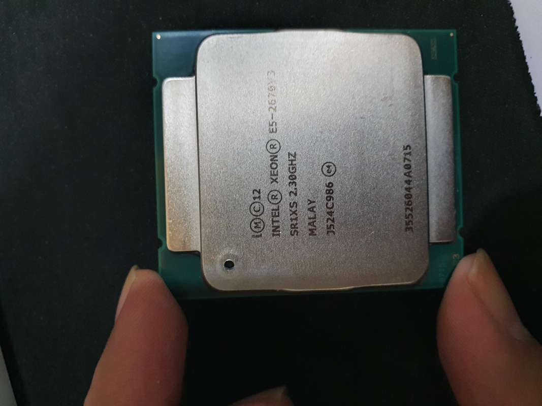 Xeon e5 2670 v3. E5 2670 v3 без крышки.