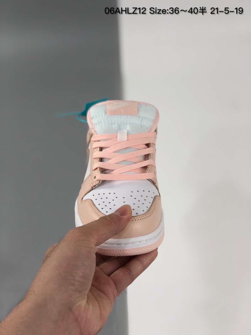 womens dunk low orange pearl on feet