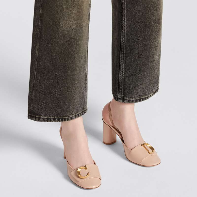ALAIA FLAT SLINGBACK IN ROSE PINK PATENT CALFSKIN AND FILM