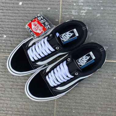 all black vans pro