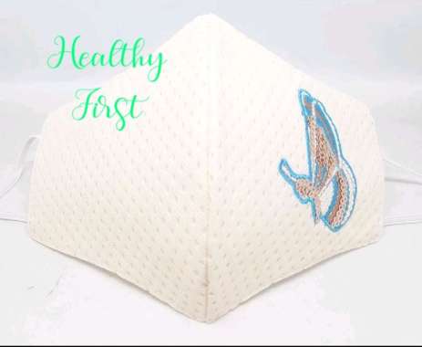 Masker bordir kupu tunggal krem kupu biru