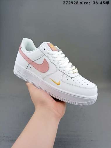 white and pink shoes nike