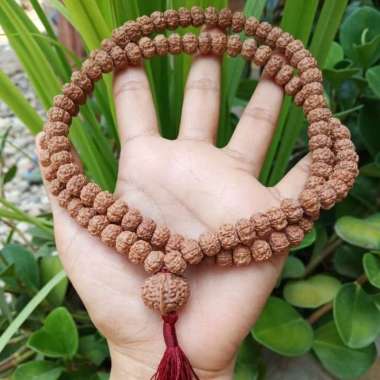 kalung atau tasbih jenitri rudraksha dengan liontin Ganesha