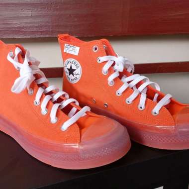 neon orange chuck taylors