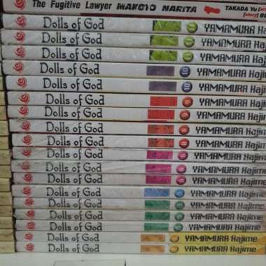 KOMIK DOLLS OF GOD