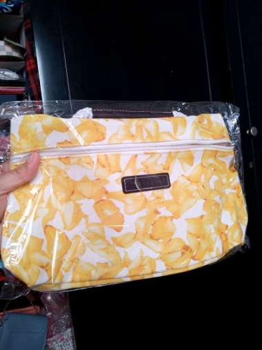 harga pouch longchamp original