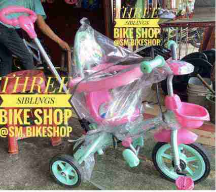 SEPEDA RODA TIGA TREX UNICORN DISERTAI LAMPU DAN MUSIK PINK TOSCA