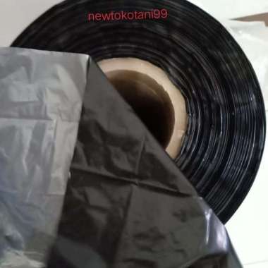 Plastik mulsa hitam perak penutup tanah dan packing lebar 120cm eceran