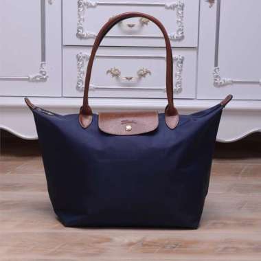 blue longchamp bag Cinosural International School