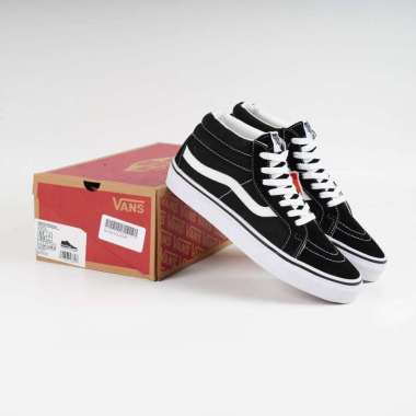 black and white vans leather
