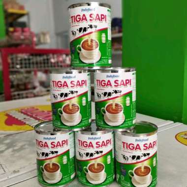 Tiga Sapi Susu Kental Manis