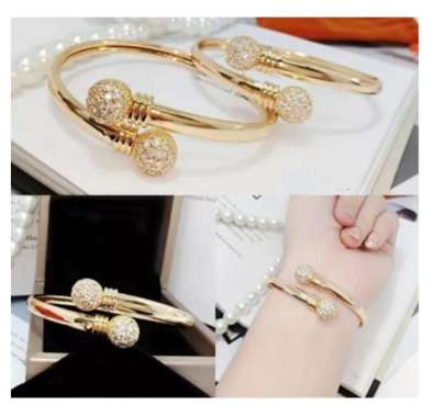 Gelang titanium Gold motif bola permata