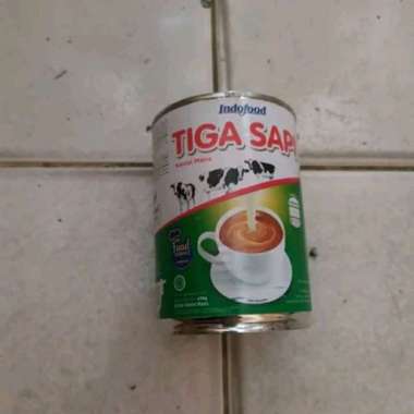 Susu TIga Sapi Kaleng